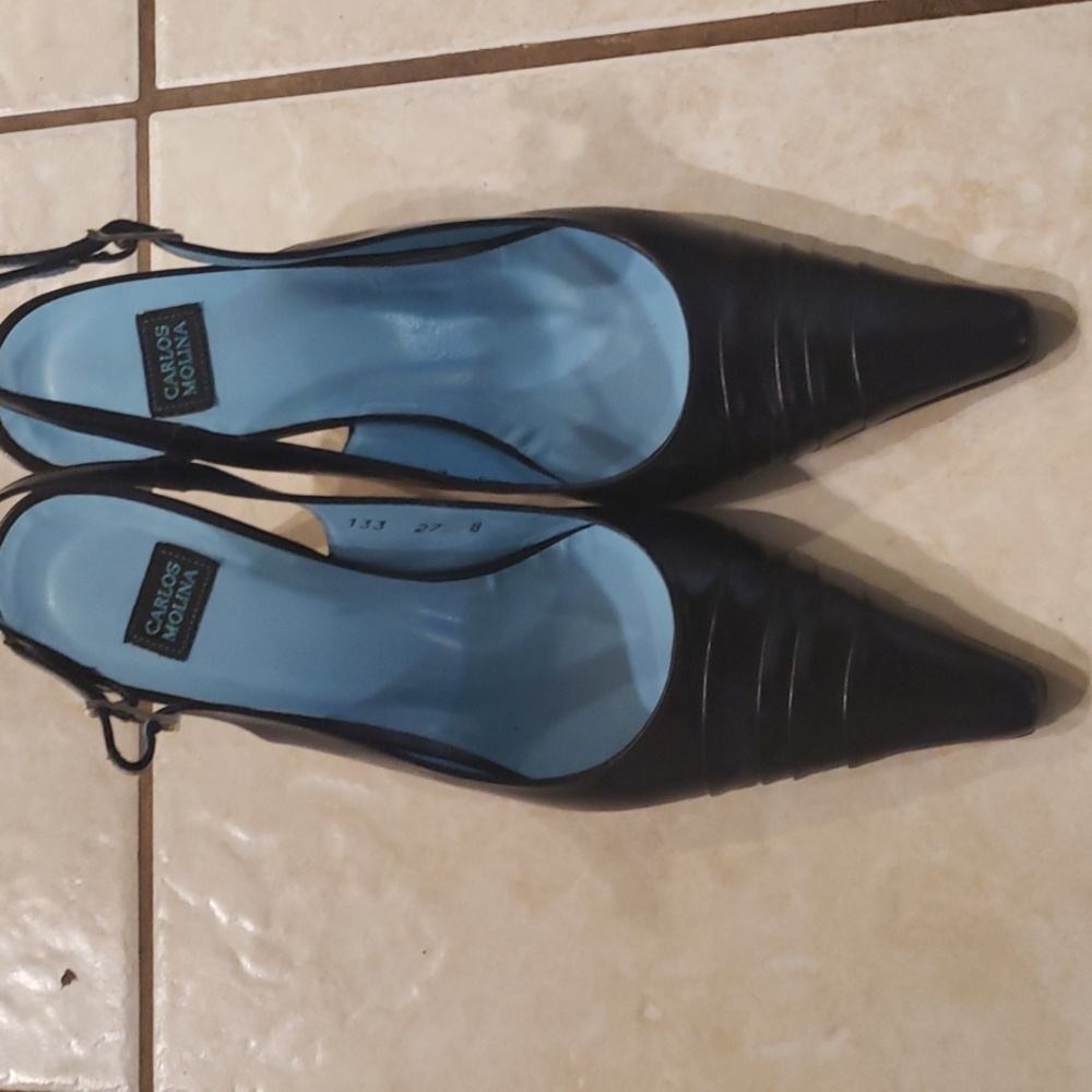 Black leather sling back pumps